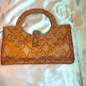 Sarah Shaw Los Angeles Gold Pattern Boutique Handbag with Button Closure
